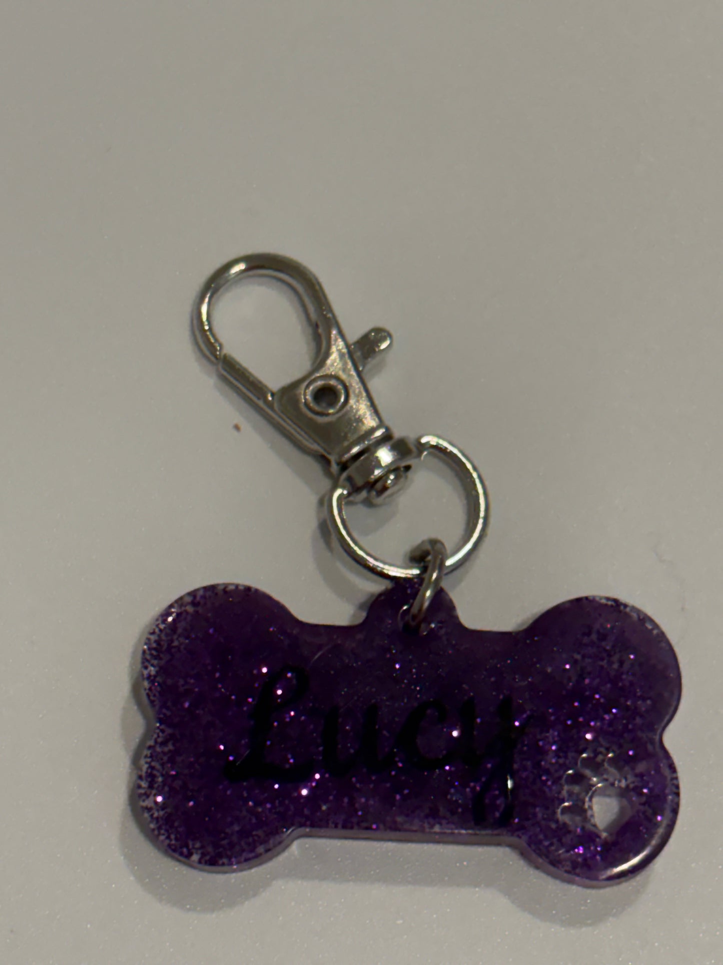 Small bone pet tag with paw imprint