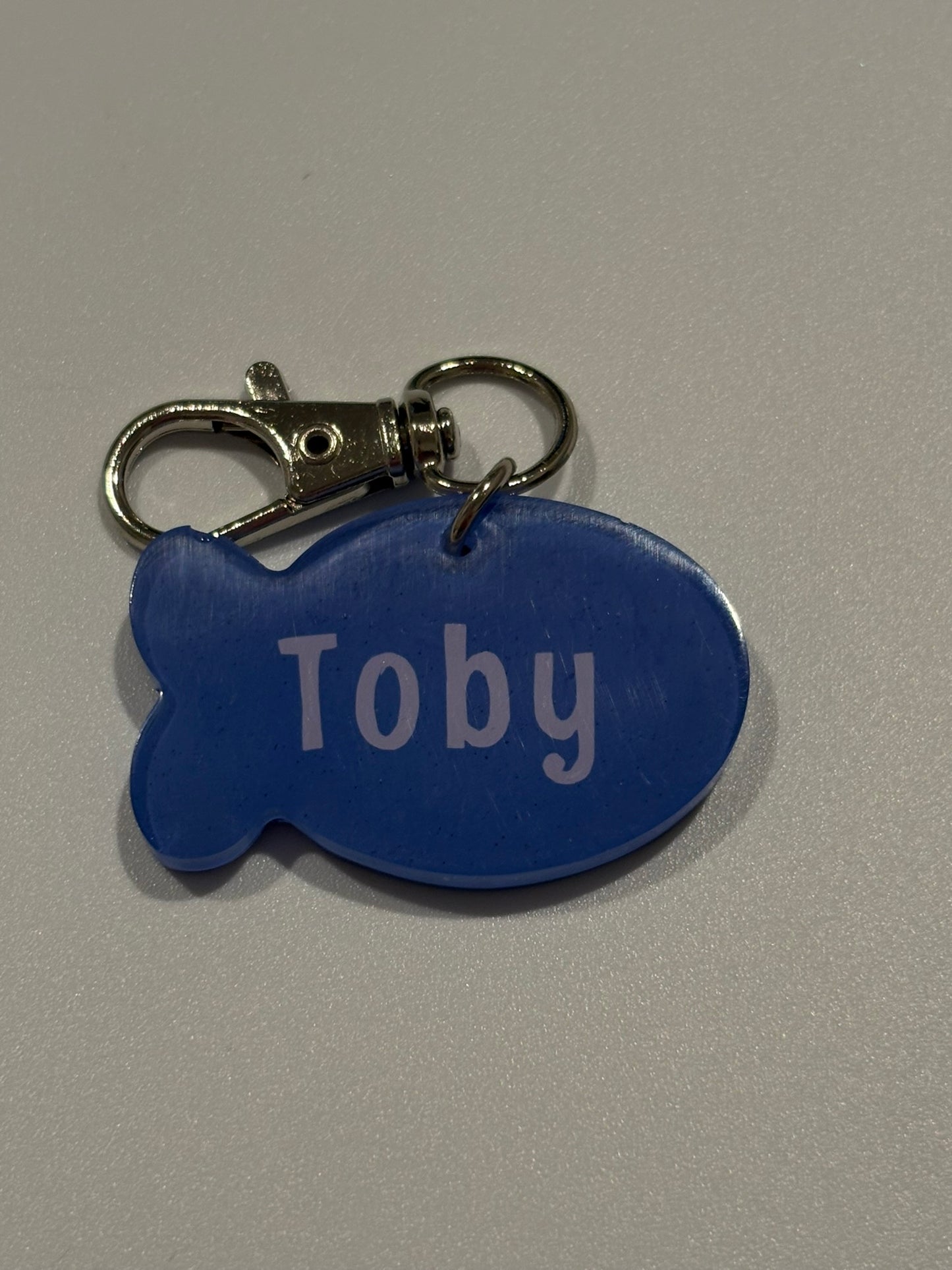small fish cat tag